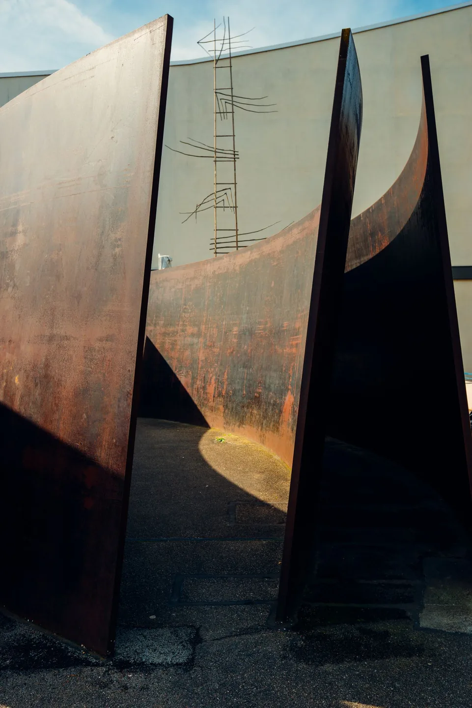 Curving steel plates of Richard Serra’s Intersection outside Theater Basel