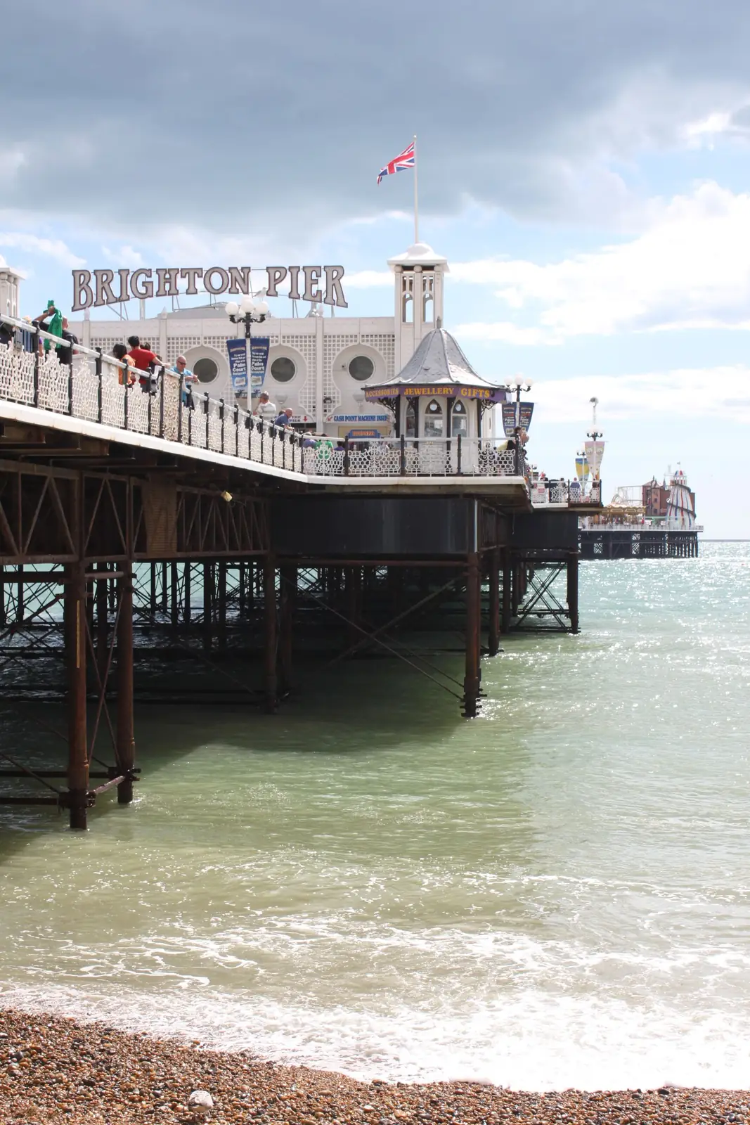 Brighton Palace Pier above the shore and waves