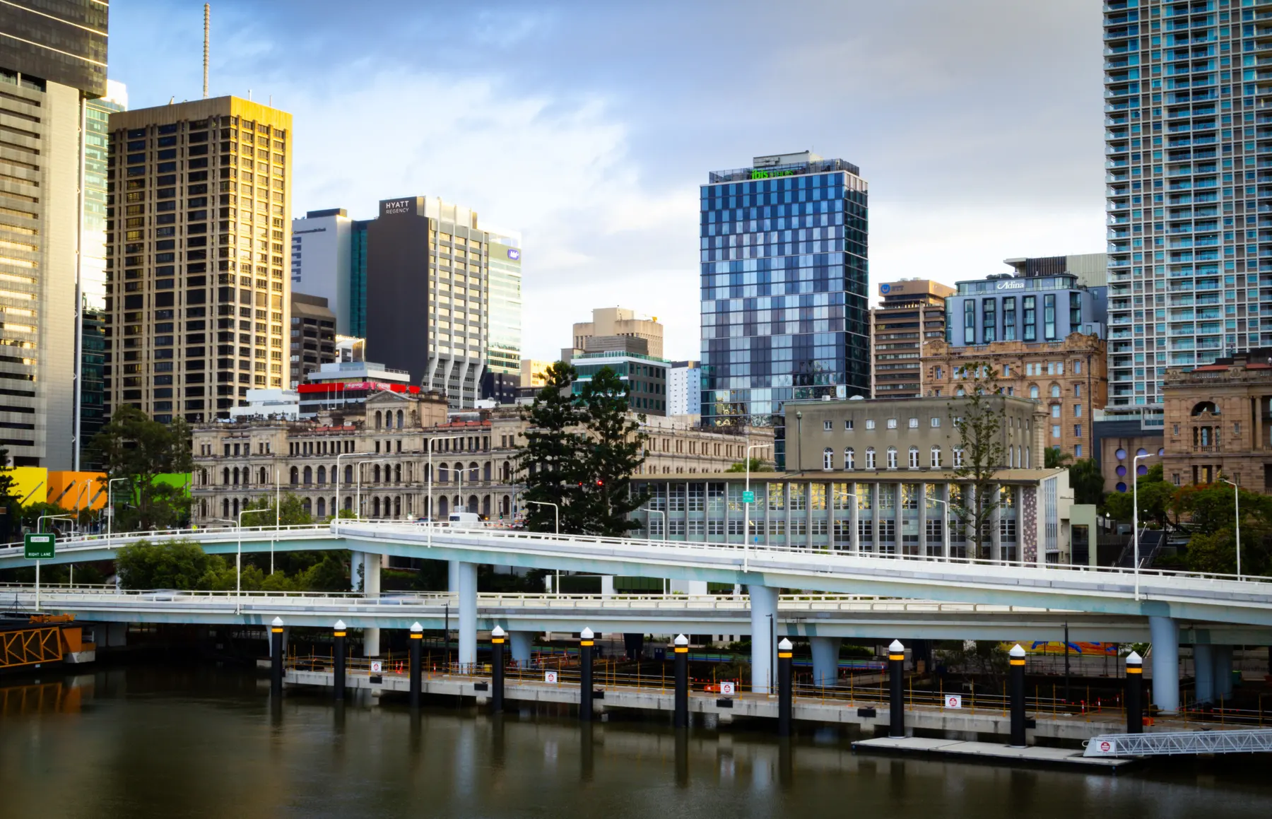 Victoria Bridge in front of Brisbane’s Treasury building and city towers