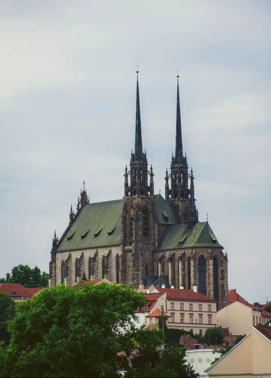 The twin spires and green roof of Brno’s Cathedral of St Peter and Paul on Petrov