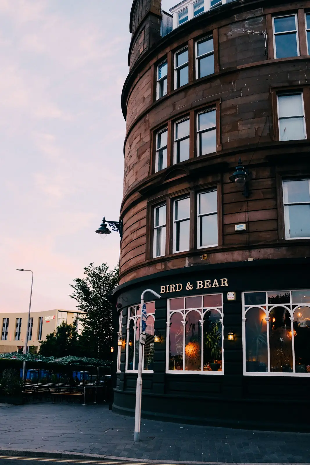 Curved stone building and street corner in central Dundee