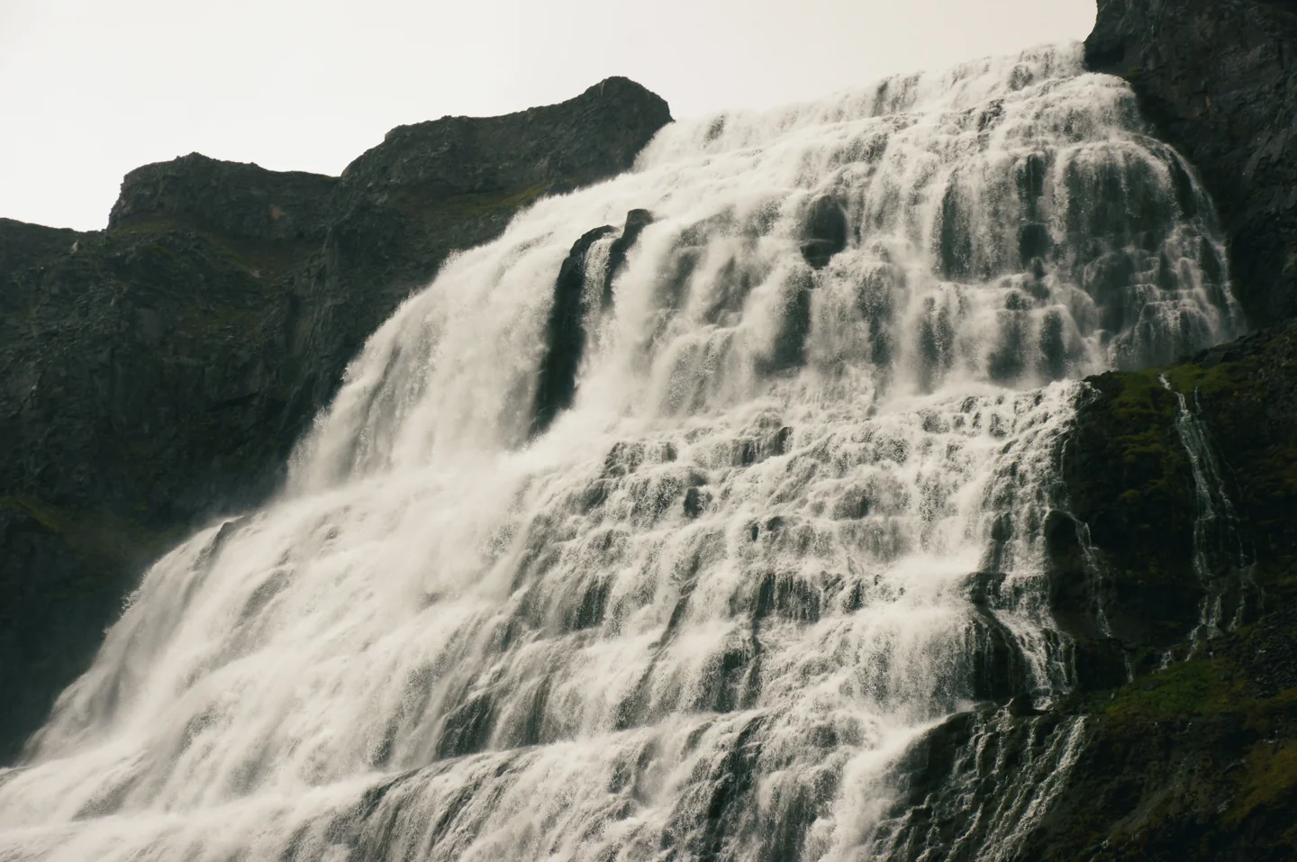Dynjandi’s broad cascade flowing down the stepped rock face