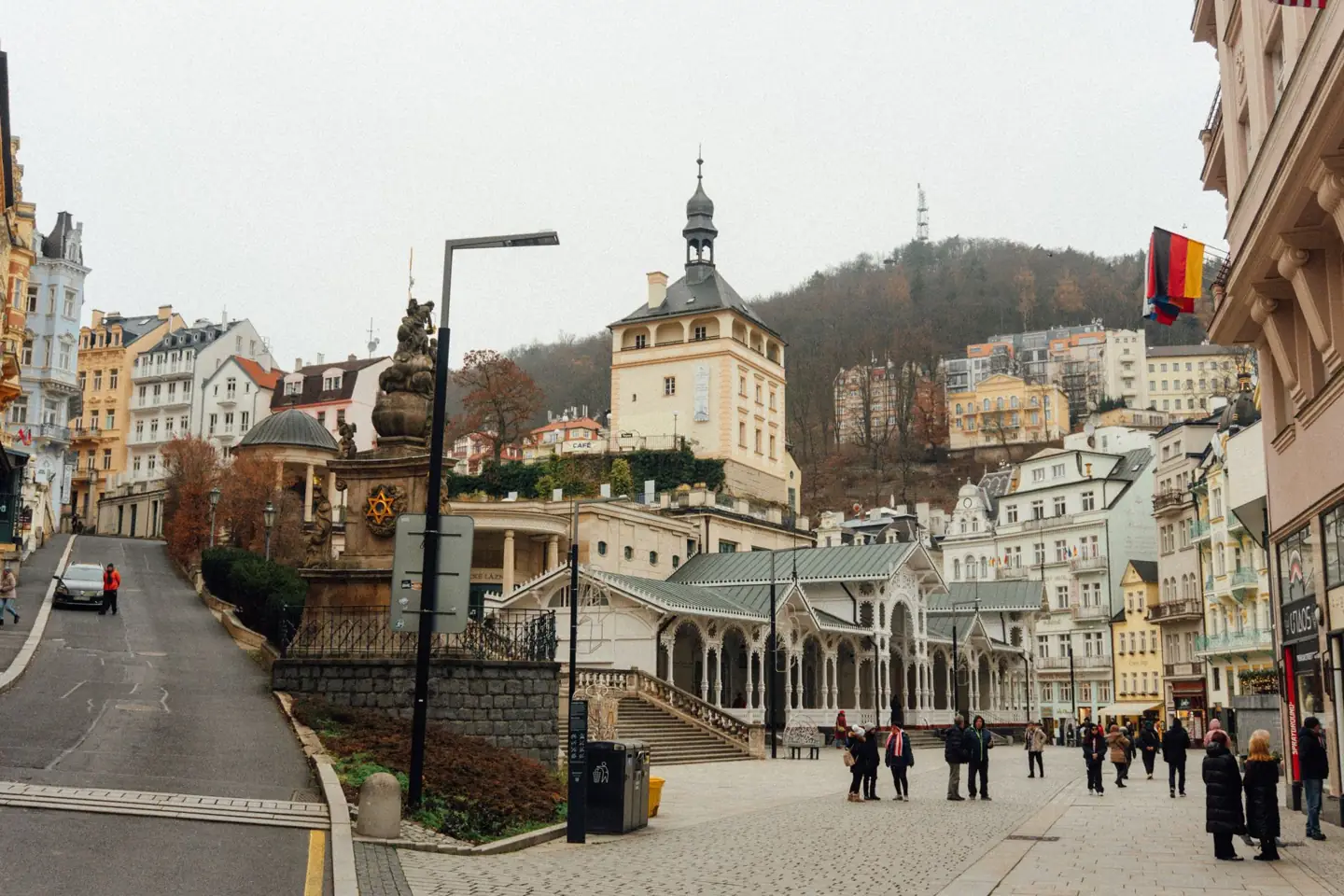 Karlovy Vary’s white Market Colonnade below the Castle Tower
