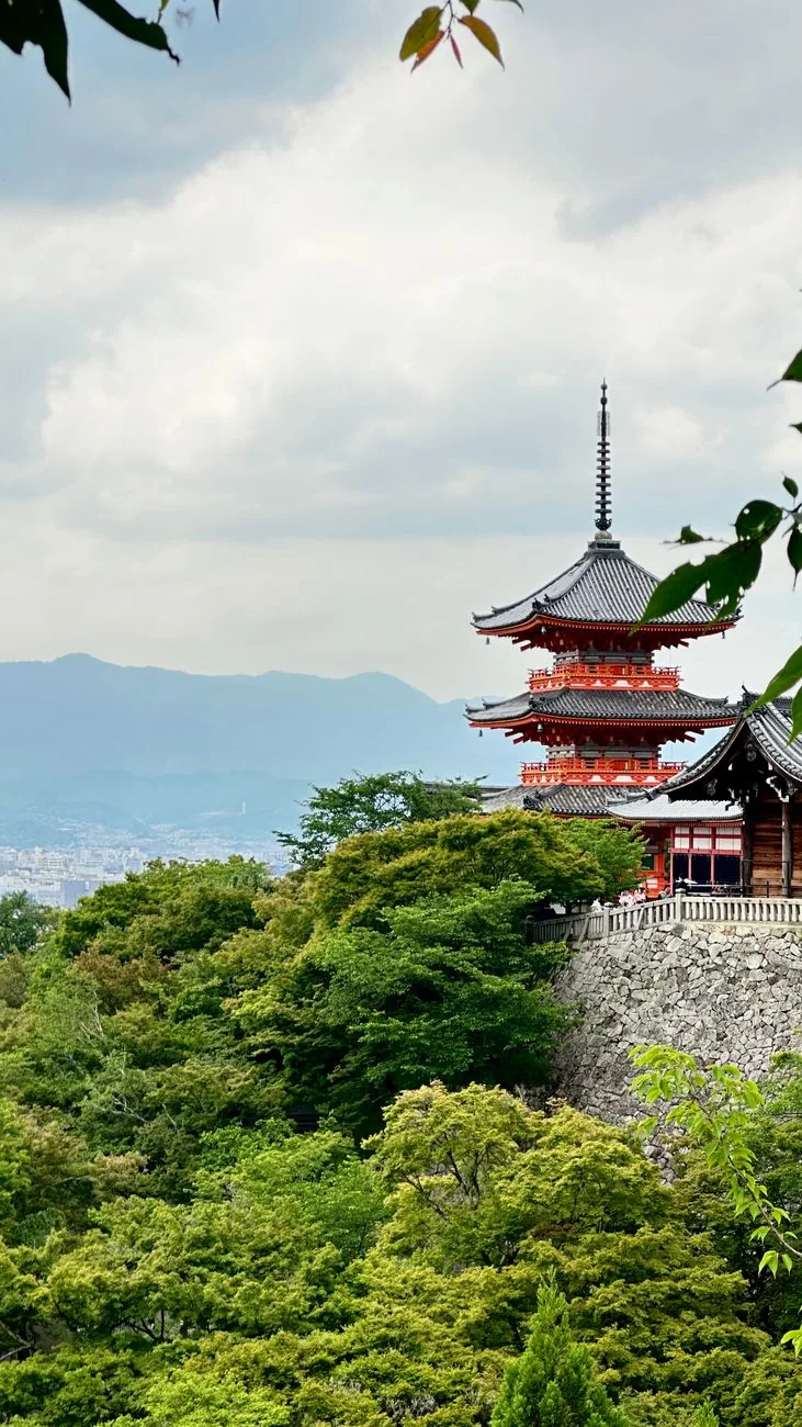 A pagoda at Kiyomizu-dera above wooded temple grounds