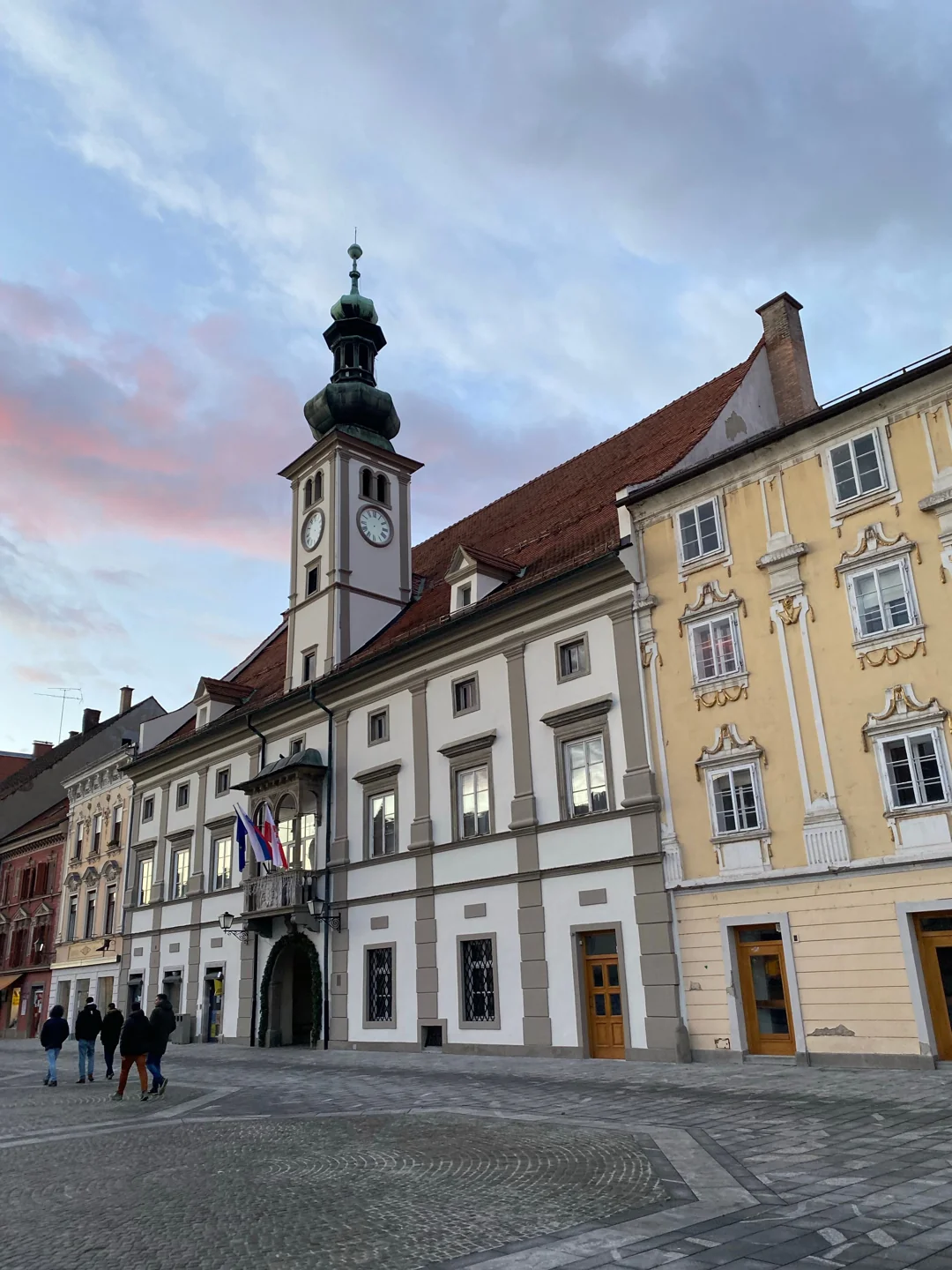 Maribor’s white town hall and clock tower on Glavni trg