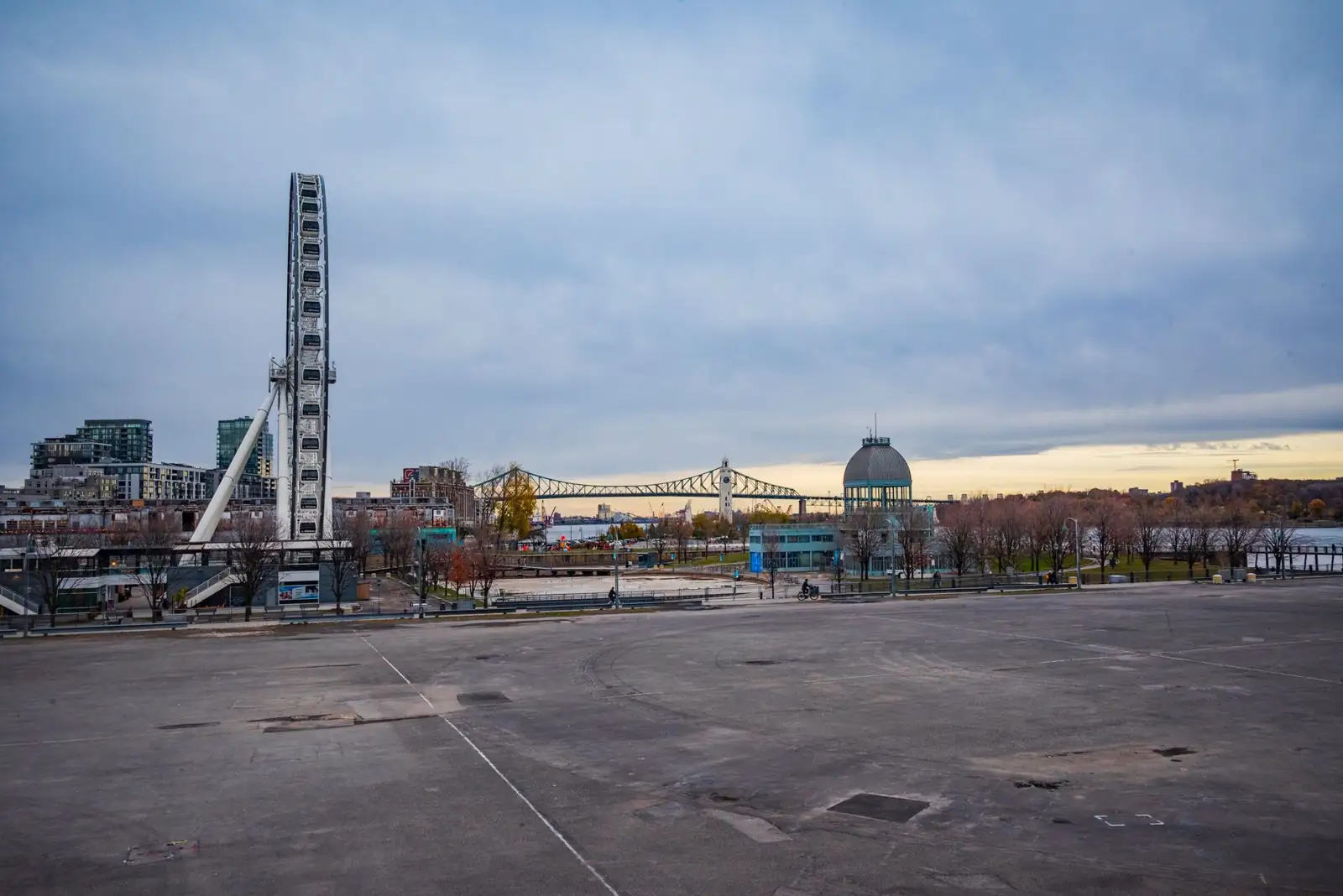 La Grande Roue de Montréal and the Old Port waterfront beneath an overcast sky