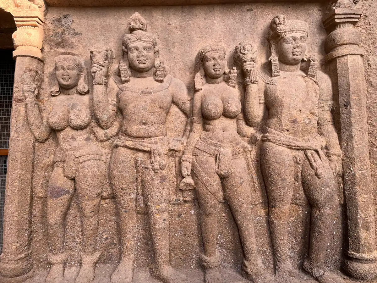 A carved Buddhist relief at Kanheri Caves in Sanjay Gandhi National Park