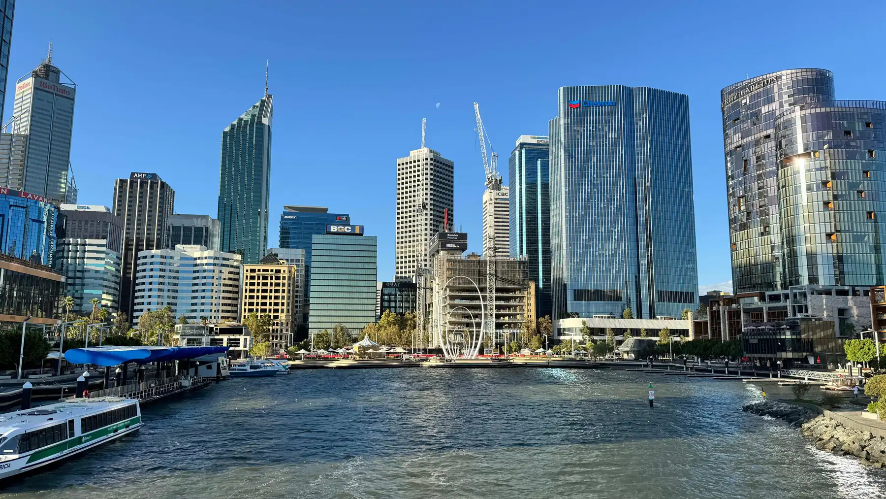 Elizabeth Quay’s inlet, ferry landing and Spanda sculpture beneath Perth’s towers