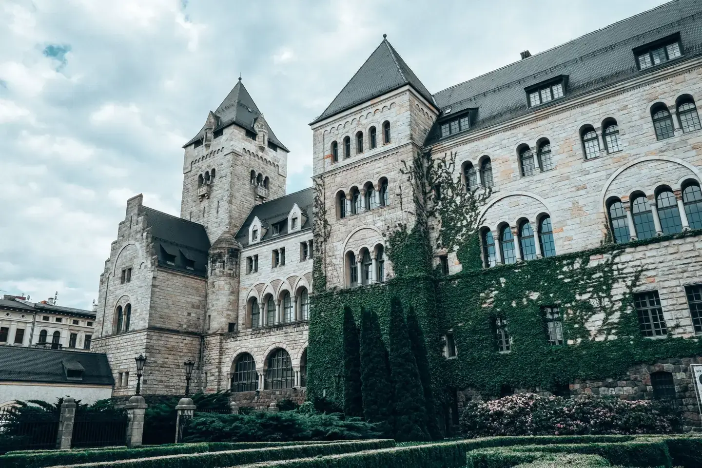 Stone towers, arcaded windows and ivy-covered walls of Poznań’s Imperial Castle, home to CK ZAMEK