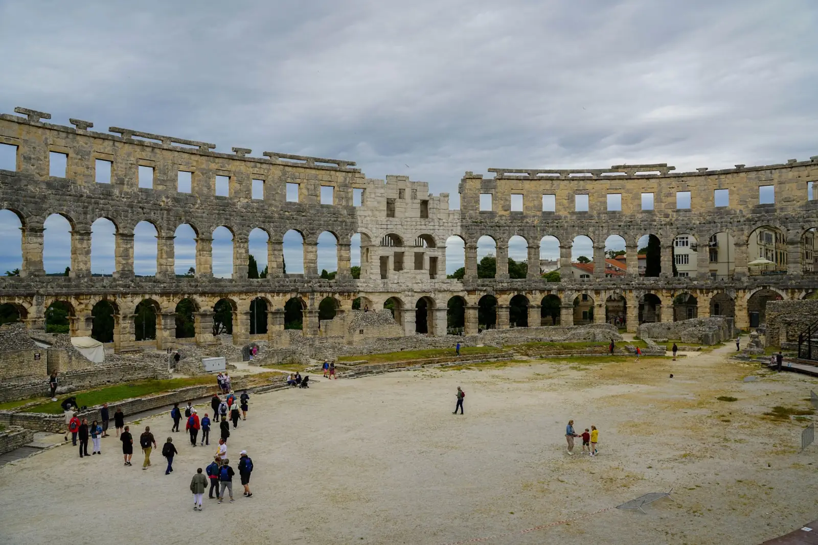 The interior of Pula Arena and its surviving stone arches