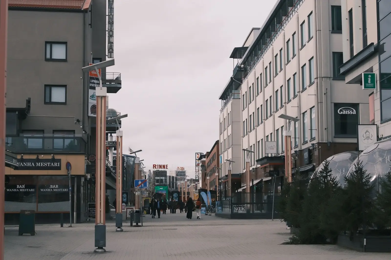 Koskikatu pedestrian street in Rovaniemi, with Santa’s Hotel Santa Claus and Rinteenkulma signs