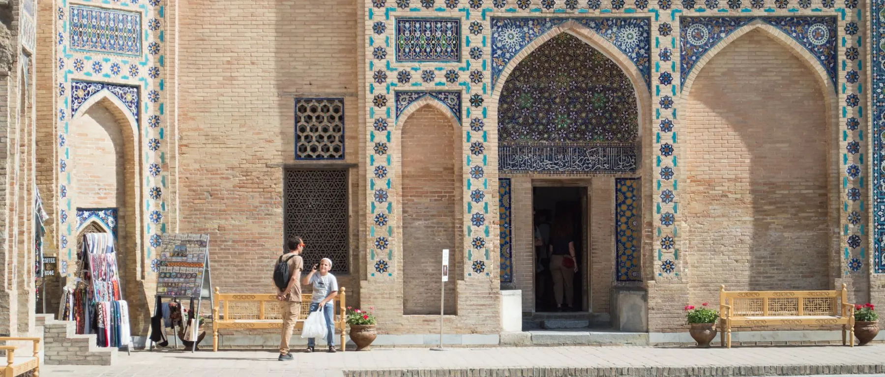 The tiled courtyard facade of Gur-e-Amir Mausoleum in Samarkand