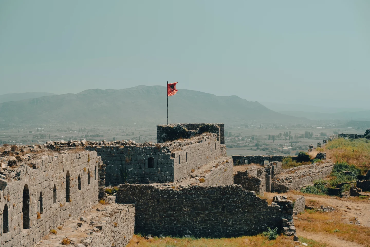 Rozafa Castle courtyards and stone fortifications overlooking the Shkodër landscape