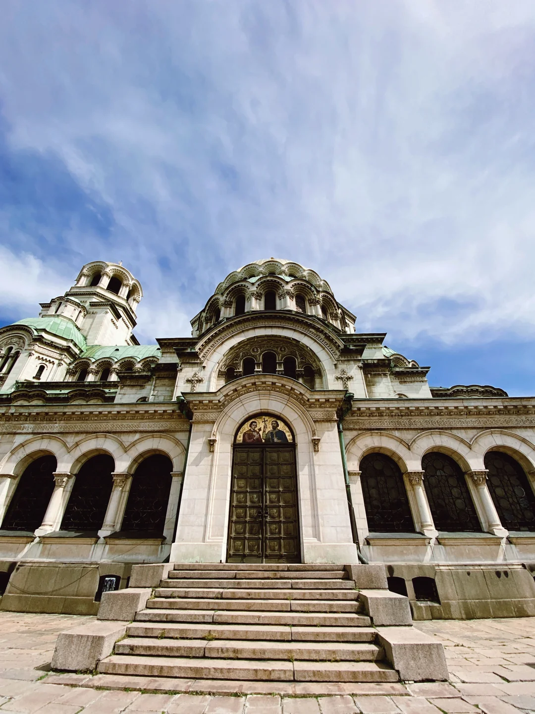 Arched entrance and domes of Alexander Nevsky Cathedral in Sofia