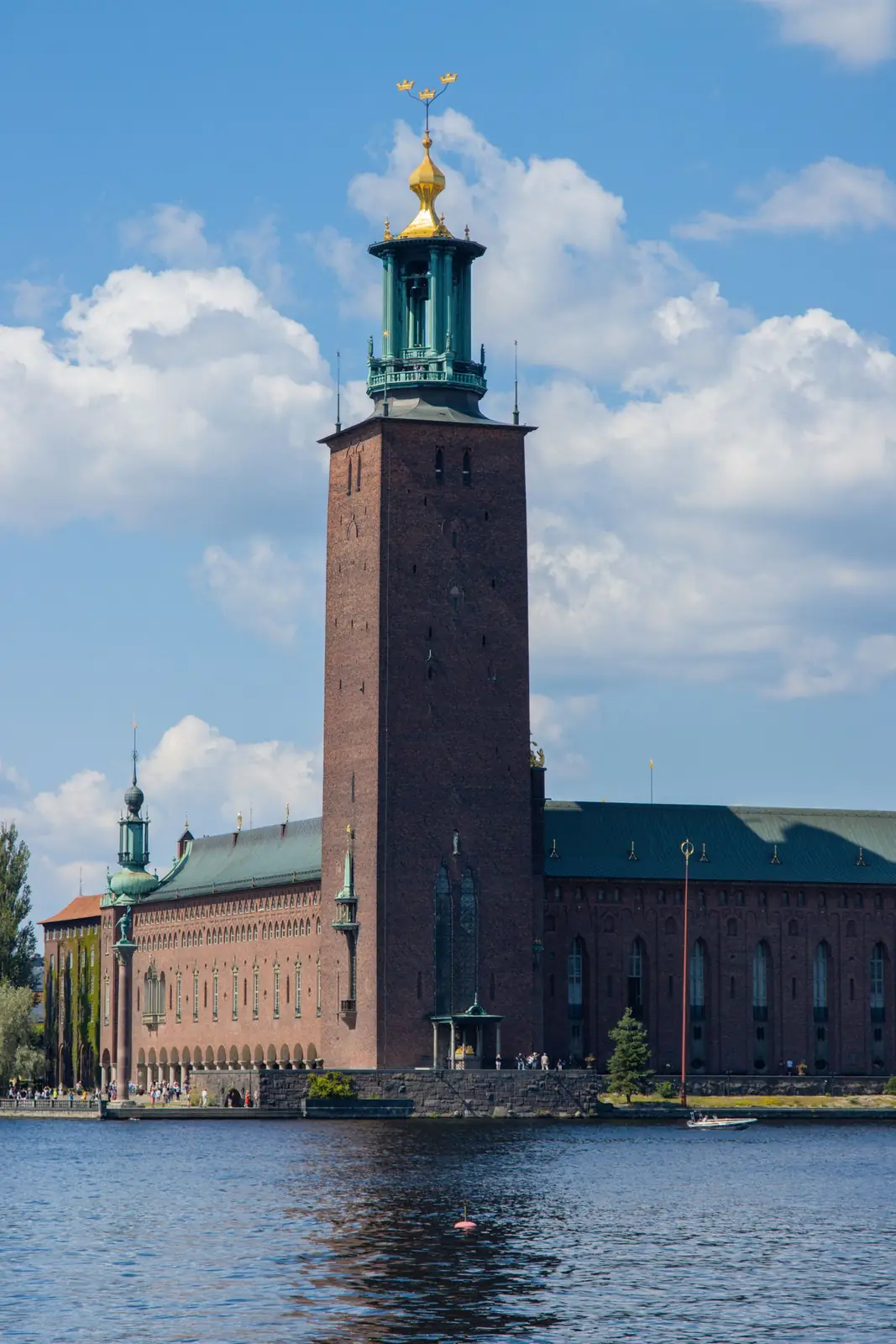Stockholm City Hall’s brick tower beside the water