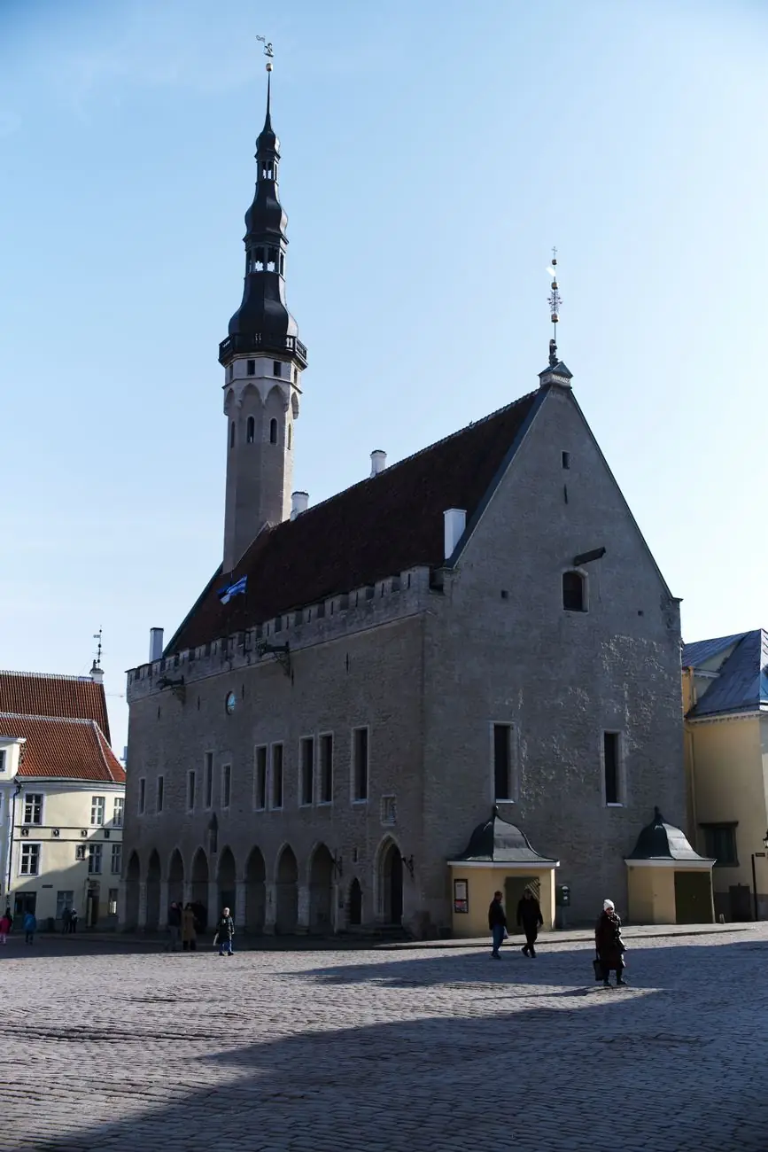 Tallinn’s Gothic Town Hall and slender tower above the cobbled Town Hall Square