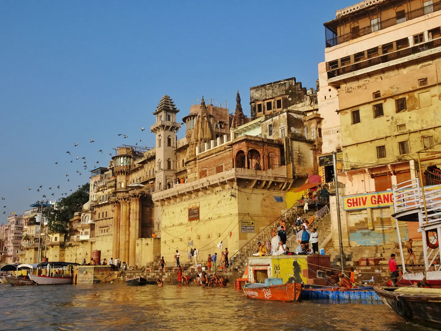 Boats and visitors along Varanasi’s historic ghats on the Ganges