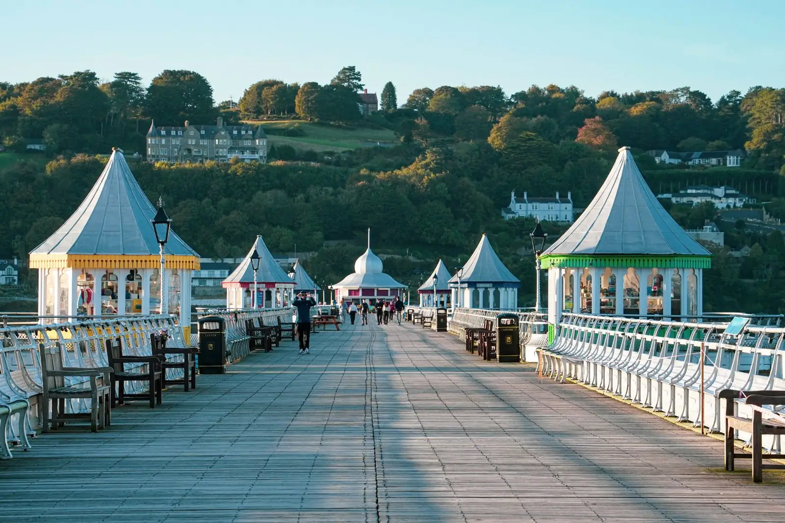 Colourful kiosks along Garth Pier in Bangor, Wales