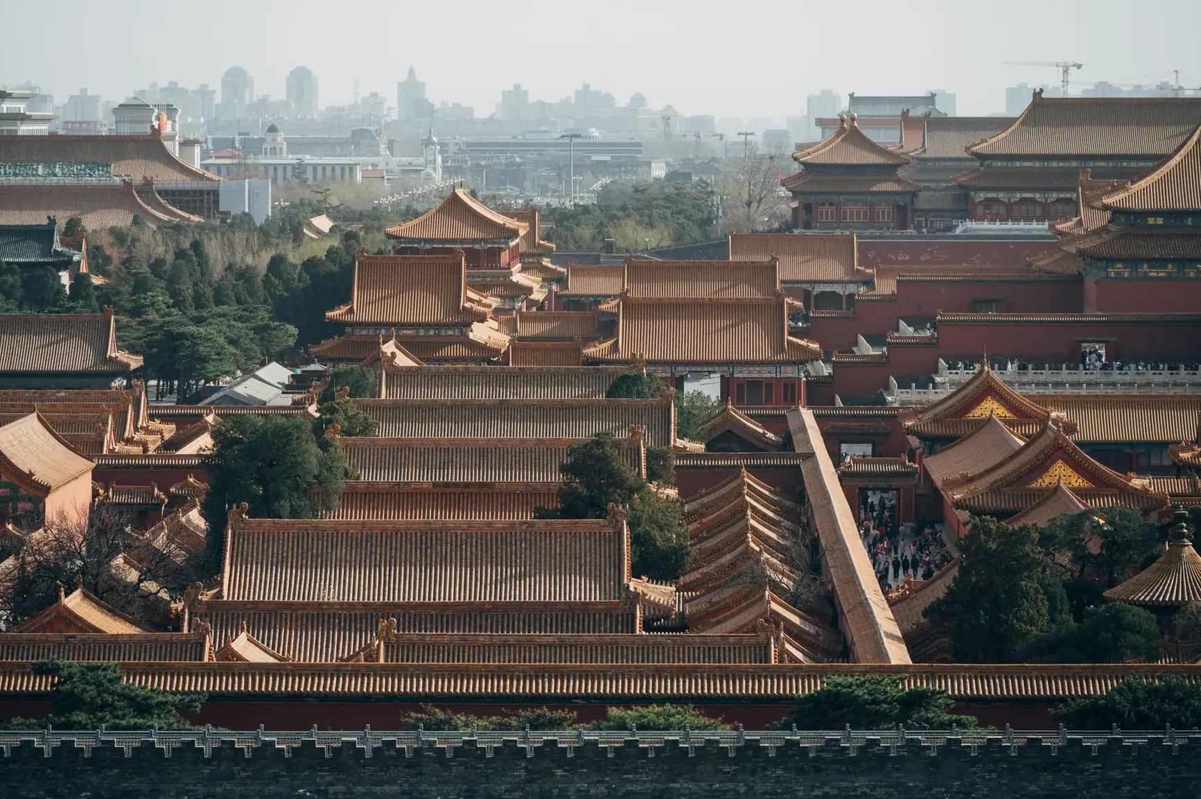 The Forbidden City’s golden roofs and northern moat viewed from Jingshan in Beijing