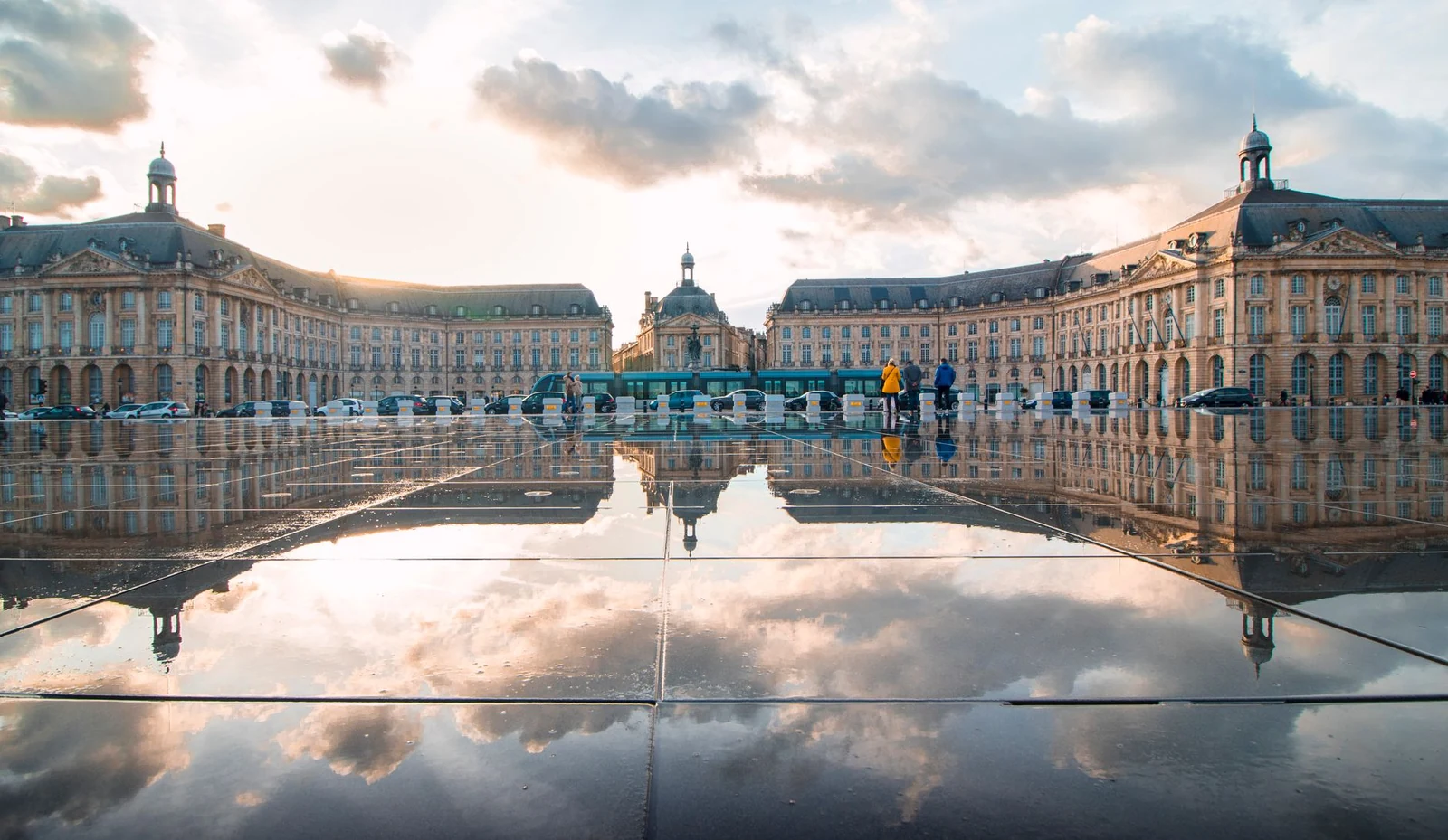 Place de la Bourse and its symmetrical reflection in the Miroir d’eau in Bordeaux