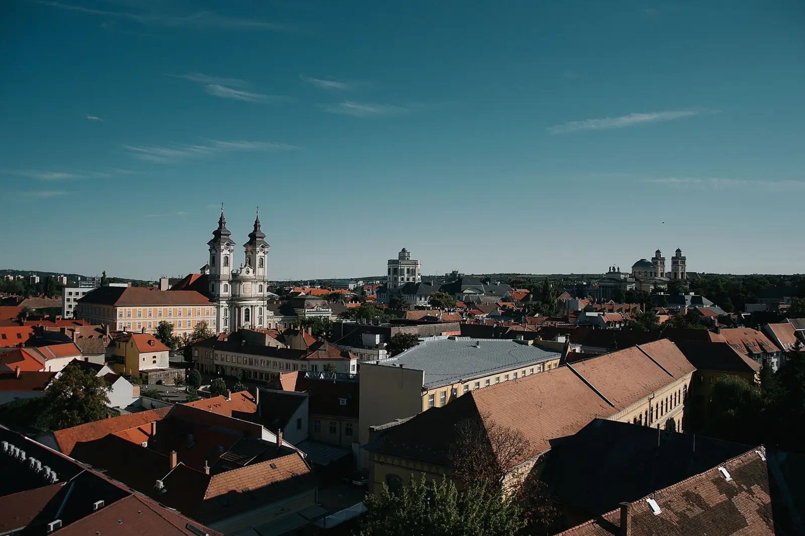 Eger’s red-roofed old town with the twin-towered Minorite Church and slender minaret beyond