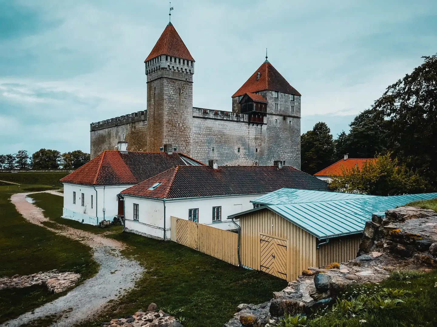 Kuressaare Castle’s square stone towers and red roofs above the courtyard buildings