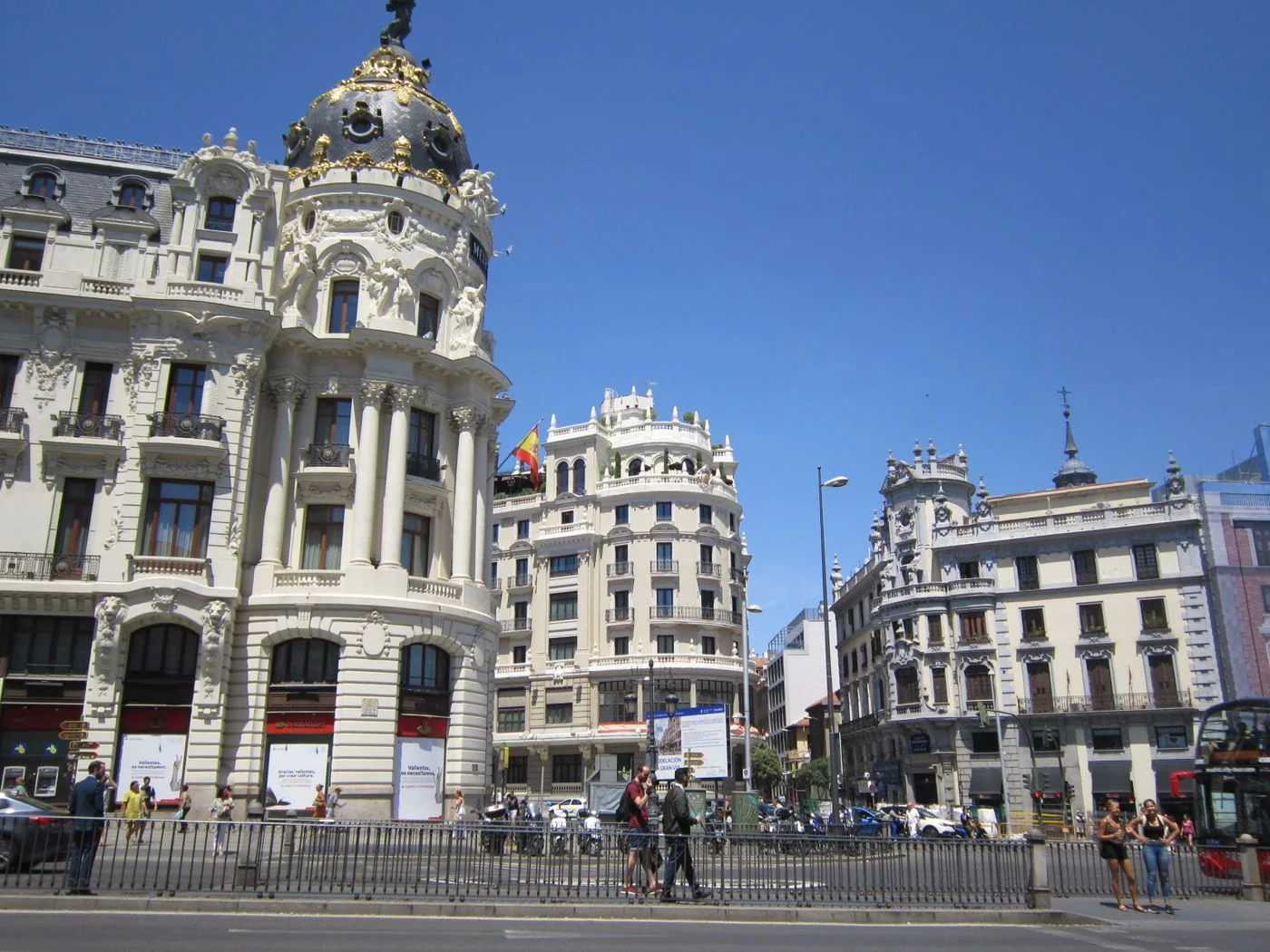 Architecture and street life on Gran Vía in Madrid