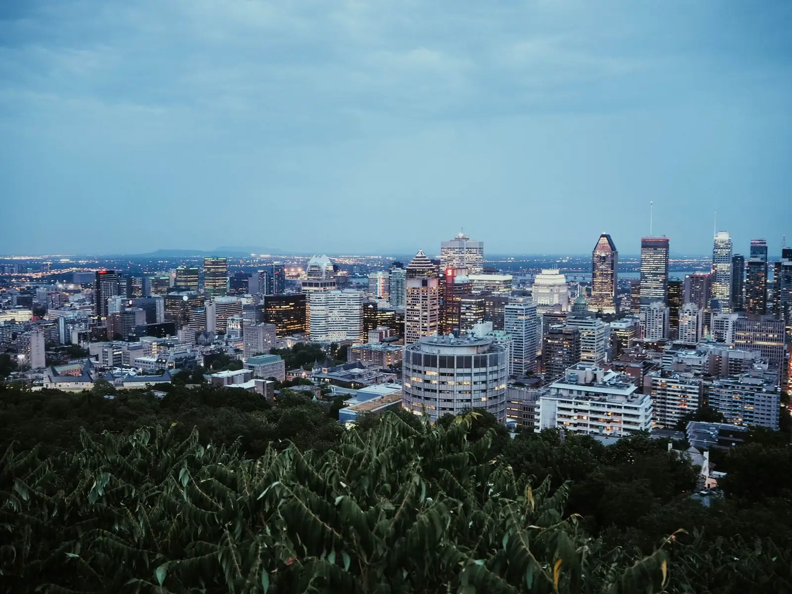 Montréal downtown skyline seen from Mount Royal at twilight