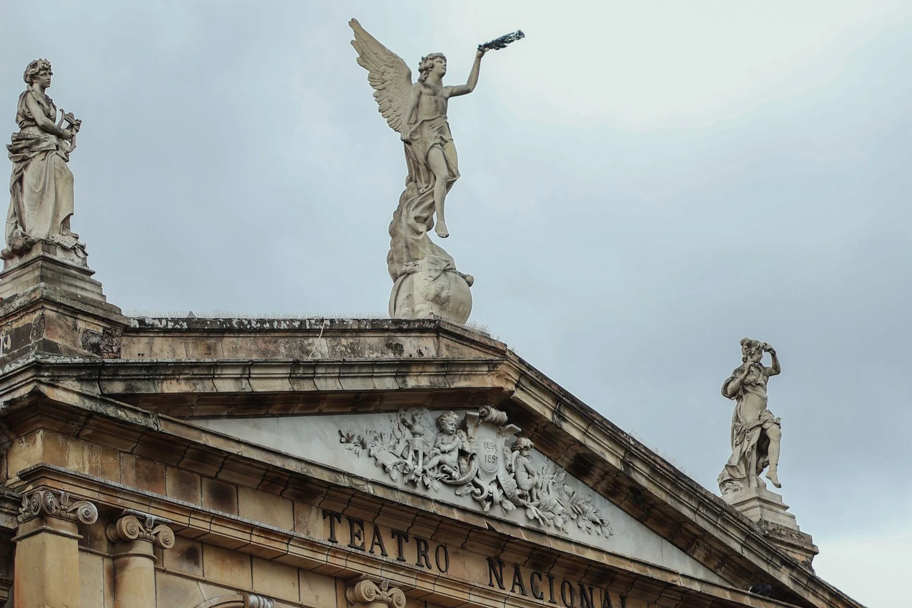 Sculptures, pediment and stone columns of the National Theatre in San José, Costa Rica
