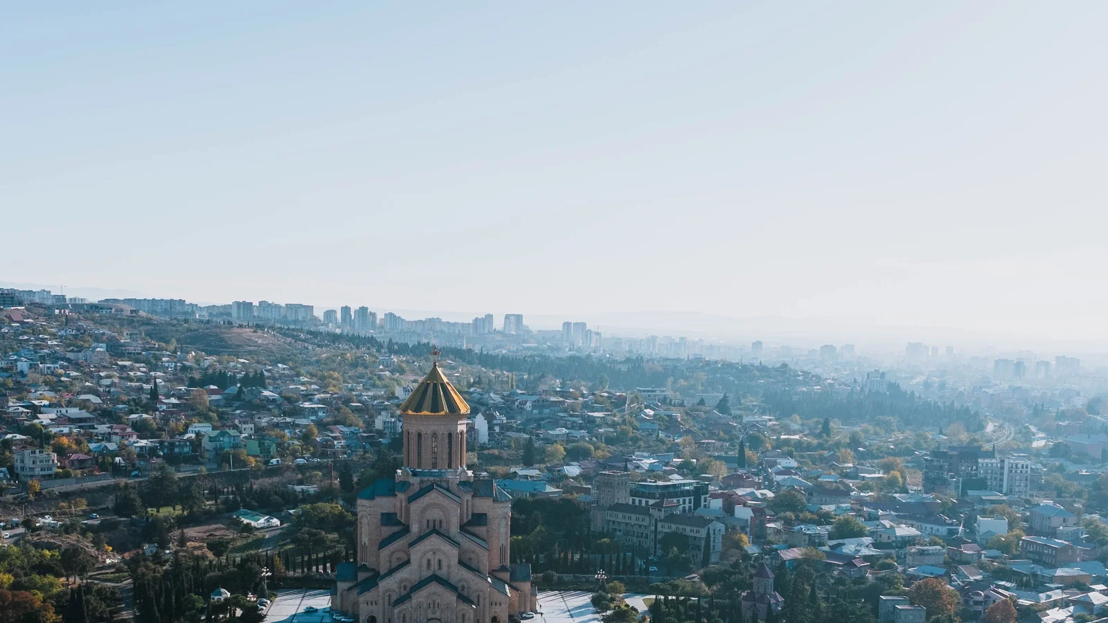 Holy Trinity Cathedral and its landscaped approach above the surrounding streets of Tbilisi.